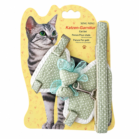 Harnais pour chat à motif étoile avec nœud en dentelle.